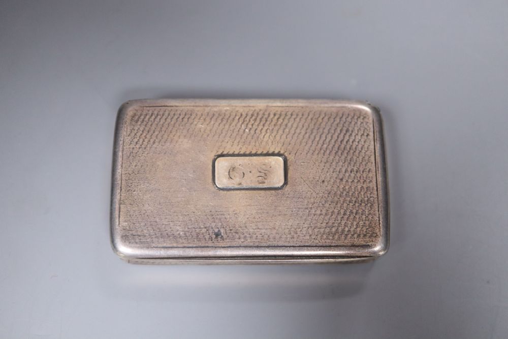 A William IV engine turned silver rectangular snuff box, Nathaniel Mills, Birmingham, 1830, 72mm (a.f.).